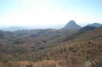 The trail crosses the canyons and ridges to the left of Elephant Tusk.