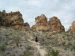 Janice climbing up to the Chimneys