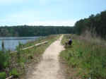 Janice eating lunch on the dam at the South end of the lake