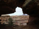 The Confluence Overlook trail passes through an arch