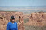 Janice in front of the "Kissing Couple"