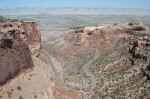 The West side entrance road switchbacks up Fruita Canyon