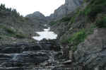 The Highline Trail crosses waterfalls streaming down from the Garden Wall ridge.