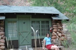 Janice outside our cabin.