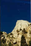 You can just see the Moon above the East face of Mount Whitney.