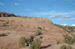 At sunset, lots of people hike the trail to Delicate Arch in Arches National Park