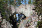 Janice behind the natural bridge.